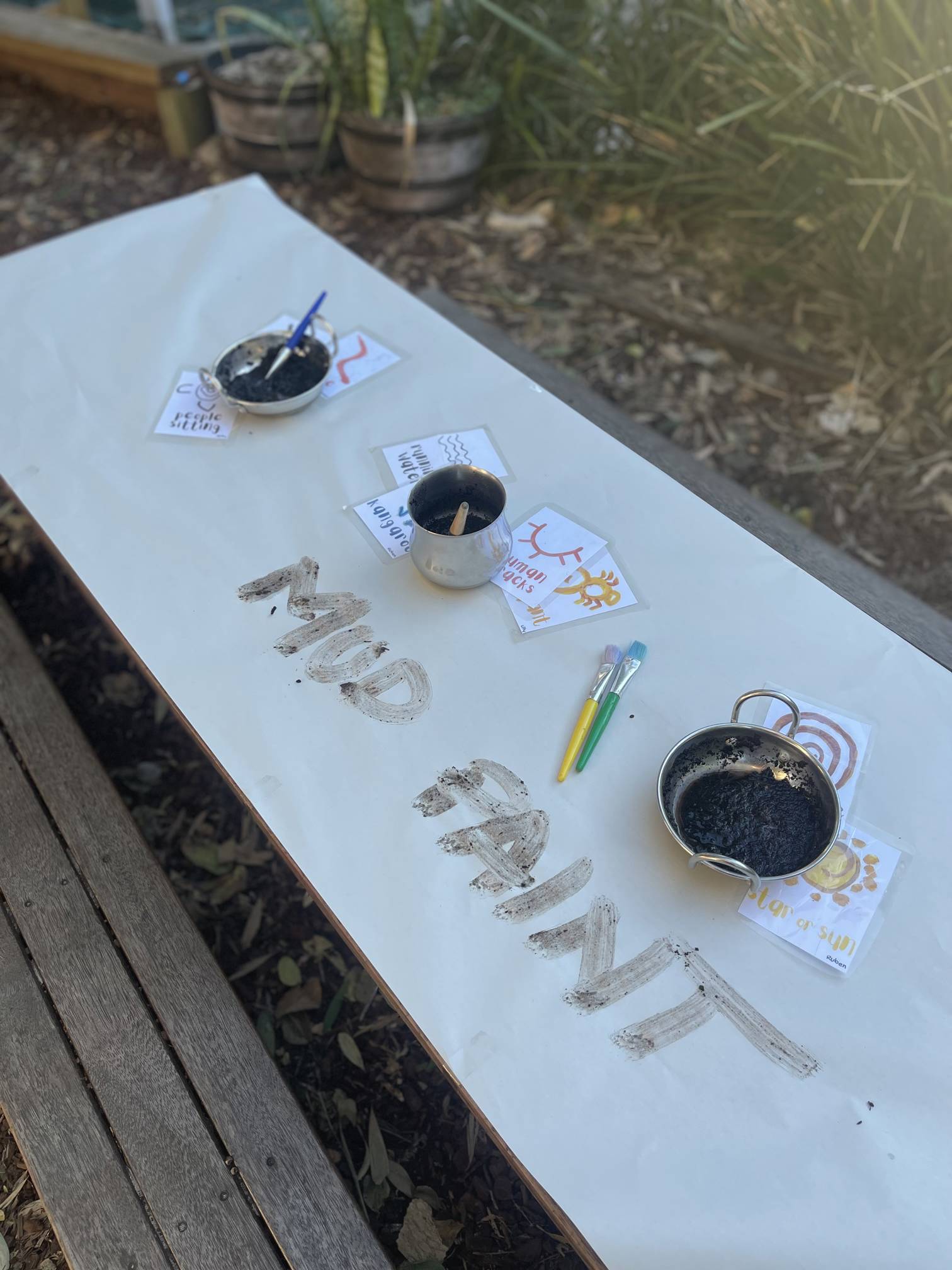 Natural mud painting experience at Lakeview Preschool